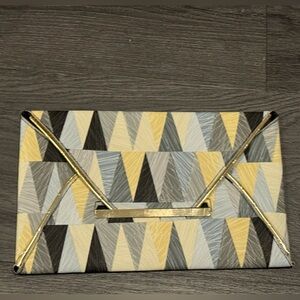 Geometric Patterned Clutch with Gold Accents